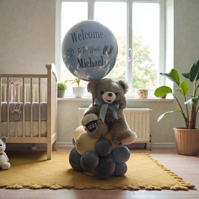 Arreglo de globos con osito de peluche y burbuja “Welcome to the World Michael”